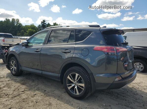 2T3RFREV4JW849611 2018 TOYOTA RAV4 Gray Trasero izquierdo