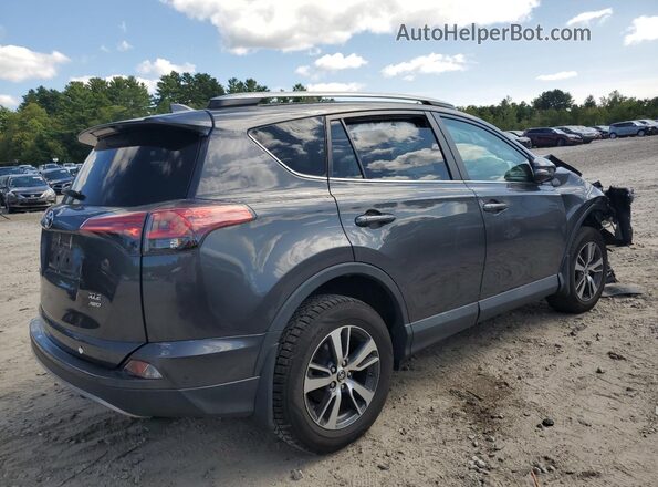 2T3RFREV4JW849611 2018 TOYOTA RAV4 Gray Trasero derecho