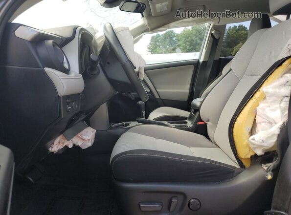 2T3RFREV4JW849611 2018 TOYOTA RAV4 Gray Vista interior delantera