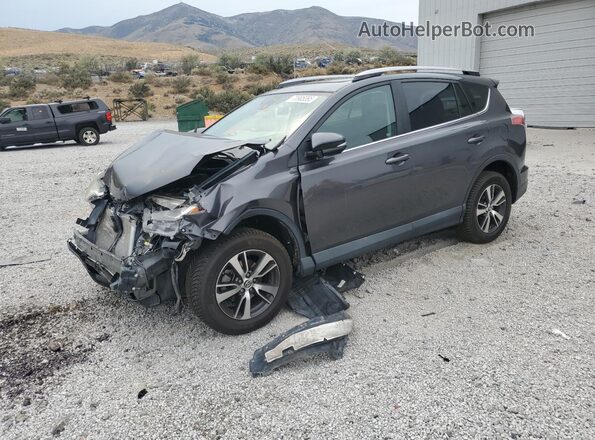2T3RFREV5JW760808 2018 TOYOTA RAV4 Gray Przód lewy