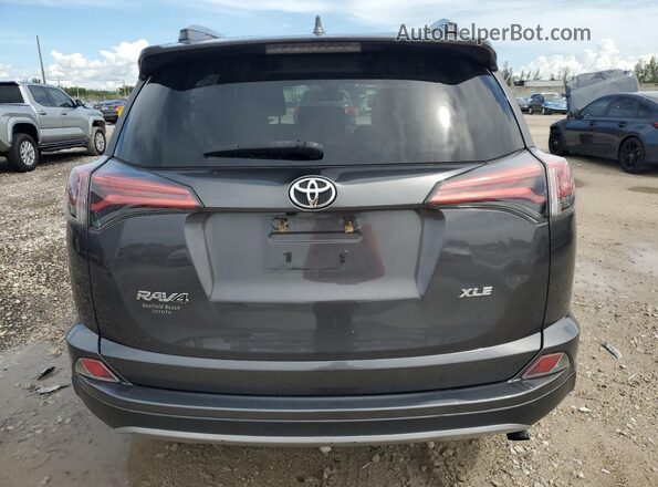 2T3WFREV5JW518569 2018 TOYOTA RAV4 Серый Вид сзади