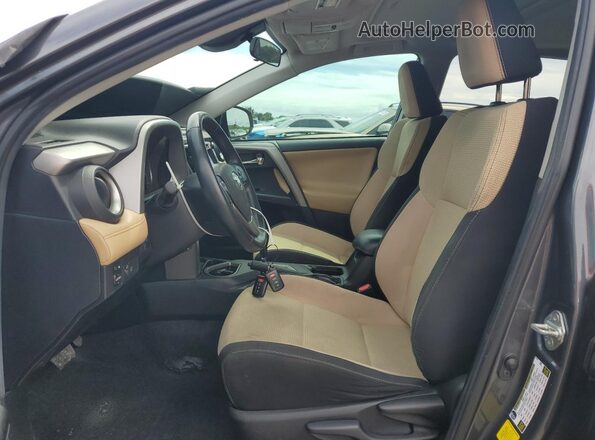2T3WFREV5JW518569 2018 TOYOTA RAV4 Серый Вид салона спереди