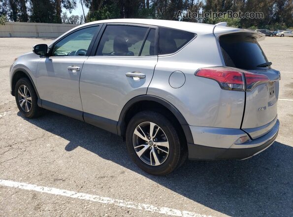 2T3WFREV6JW445129 2018 TOYOTA RAV4 Silver Հետևի ձախ