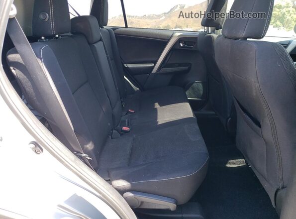 2T3WFREV6JW445129 2018 TOYOTA RAV4 Silver Հետևի նստատեղերի տեսք