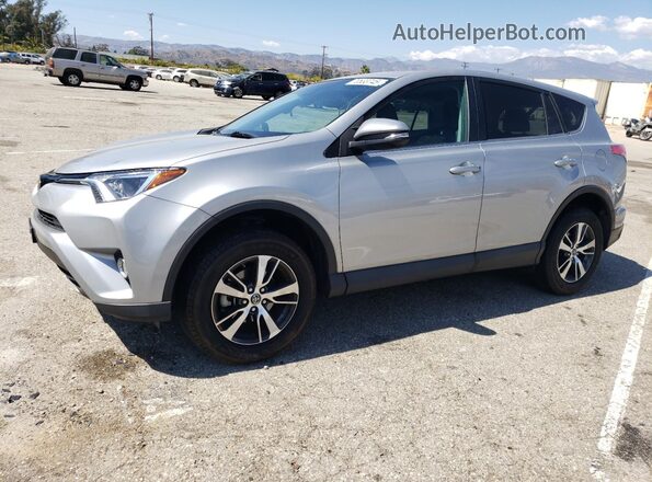 2T3WFREV6JW445129 2018 TOYOTA RAV4 Silver Առջևի ձախ երեք քառորդ տեսարան
