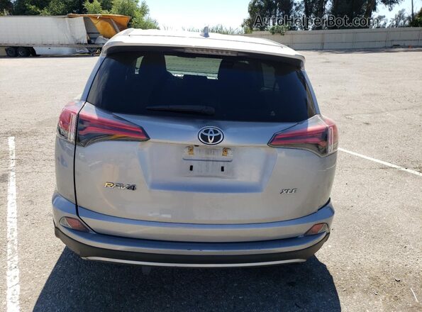 2T3WFREV6JW445129 2018 TOYOTA RAV4 Silver Հետևի տեսք