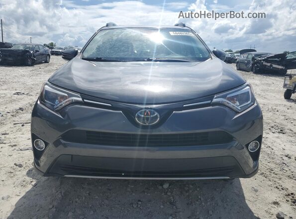 2T3YFREV2JW506257 2018 TOYOTA LIMITED Gray Вид спереду