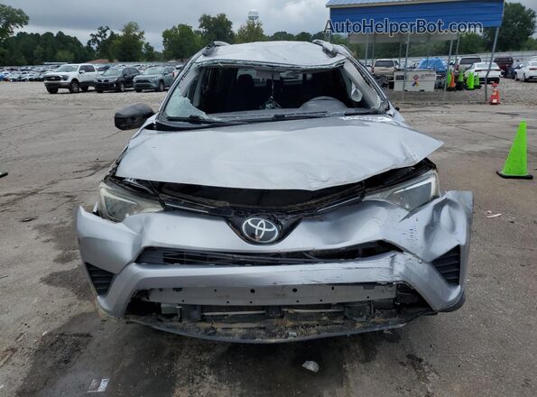 2T3ZFREV7HW360257 2017 TOYOTA LE Серебряный Вид спереди