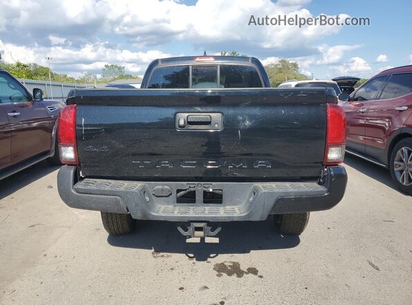 5TFSZ5AN1KX173638 2019 TOYOTA TACOMA Black Front interior view