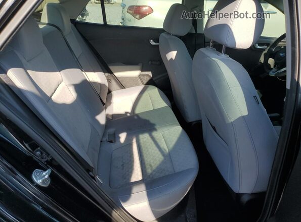 3KPA24AB4JE072964 2018 KIA RIO Black Widok wnętrza z tyłu