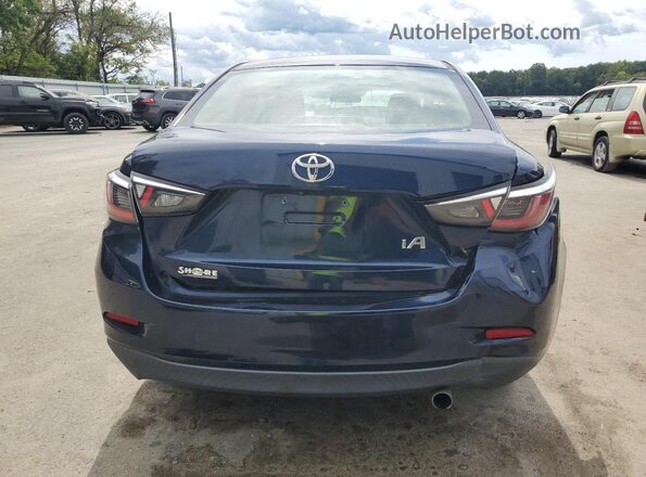 3MYDLBYV0JY327432 2018 TOYOTA YARIS Blue Rear view