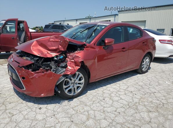 3MYDLBYV8HY174227 2017 TOYOTA YARIS Maroon Vista tres cuartos delantera izquierda