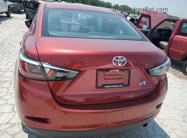 3MYDLBYV8HY174227 2017 TOYOTA YARIS Maroon Vista trasera
