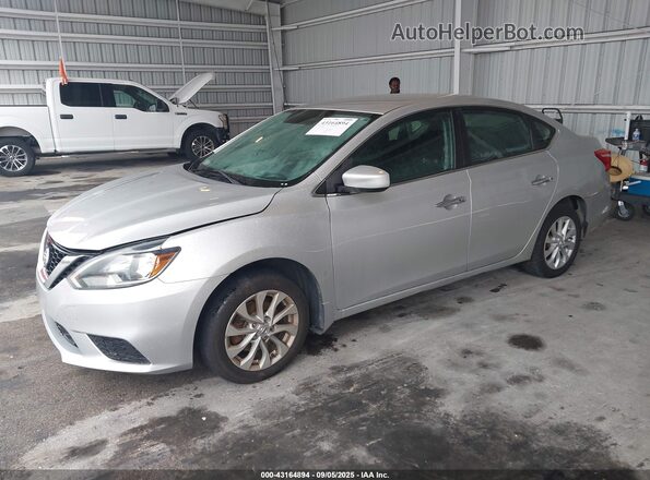 3N1AB7AP6JL646248 2018 NISSAN SENTRA Silver Przód lewy