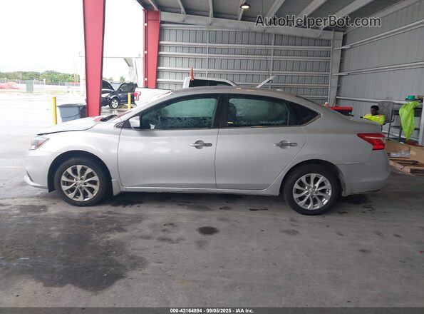 3N1AB7AP6JL646248 2018 NISSAN SENTRA Silver Widok wnętrza z tyłu