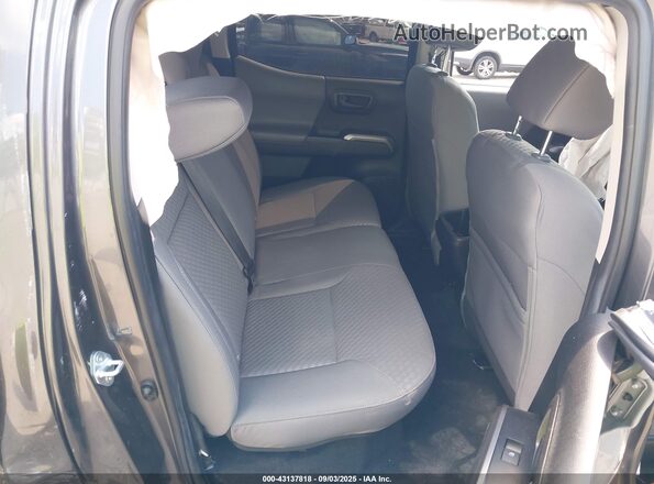 3TYCZ5AN2PT128374 2023 TOYOTA TACOMA Серый Вид салона спереди