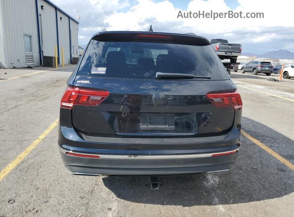 3VV3B7AX1JM101916 2018 VOLKSWAGEN TIGUAN Black უკანა ხედი