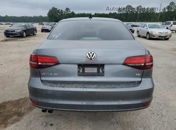 3VWDB7AJ3JM263235 2018 VOLKSWAGEN JETTA Gray Rear view