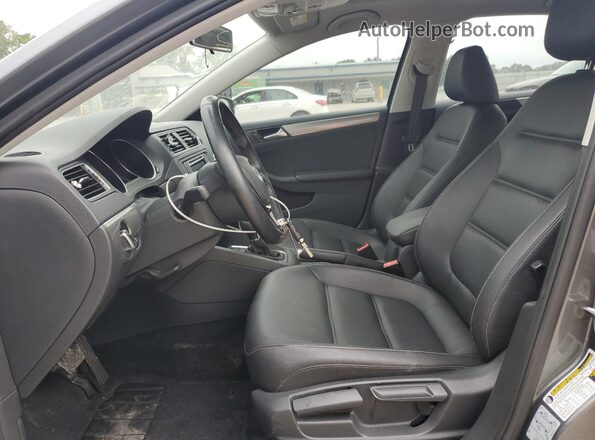 3VWDB7AJ3JM263235 2018 VOLKSWAGEN JETTA Gray Front interior view
