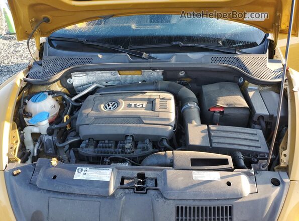 3VWS17AT1HM624757 2017 VOLKSWAGEN BEETLE Gold Rear interior view