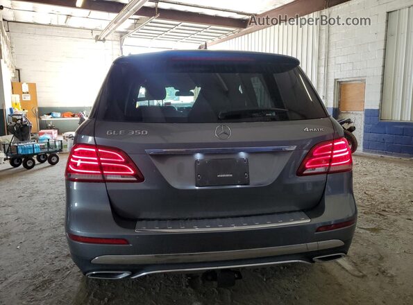 4JGDA5HB6JB144252 2018 MERCEDES-BENZ GLE Gray Հետևի տեսք