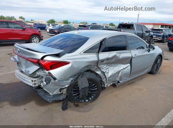4T1EA1AB1MU010653 2021 TOYOTA AVALON Серебряный Вид спереди