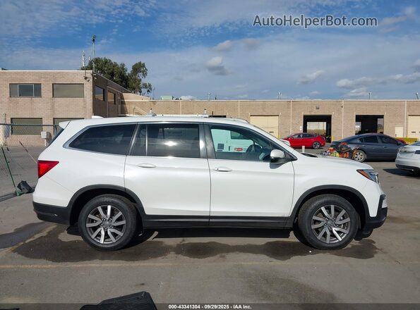5FNYF5H54MB011668 2021 HONDA PILOT Белый Вид задней части салона