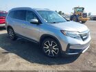 2020 Honda Pilot 2wd Touring 7 Passenger Silver vin: 5FNYF5H65LB025229