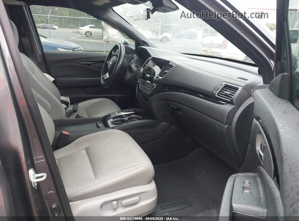 5FNYF7H98MB012921 2021 HONDA PASSPORT Серый Вид салона спереди