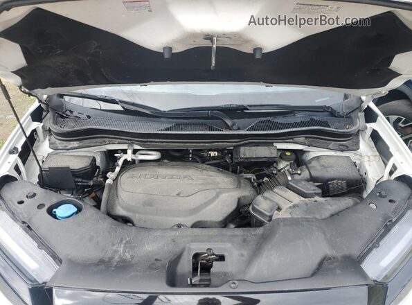 5FNYF8H00NB007902 2022 HONDA PASSPORT Белый Вид салона спереди