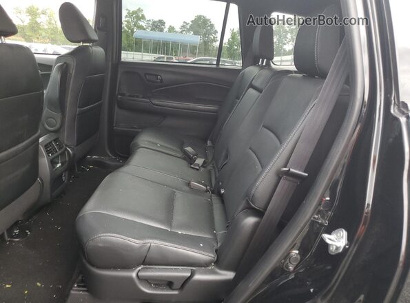 5FNYF8H56NB018477 2022 HONDA PASSPORT Черный Вид задней части салона