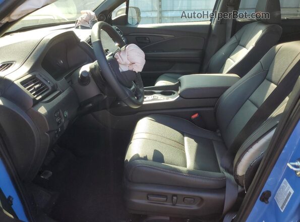 5FNYF8H69RB012767 2024 HONDA PASSPORT Синий Вид салона спереди