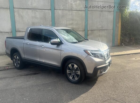 5FPYK3F74JB003769 2018 HONDA RIDGELINE Silver Vista tres cuartos delantera izquierda