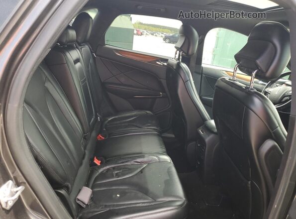5LMCJ3C92JUL29016 2018 LINCOLN MKC Gray Vista interior trasera