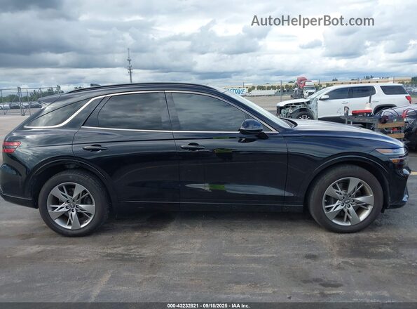 5NMMCDTC2RH016591 2024 GENESIS GV70 Black Vista interior trasera
