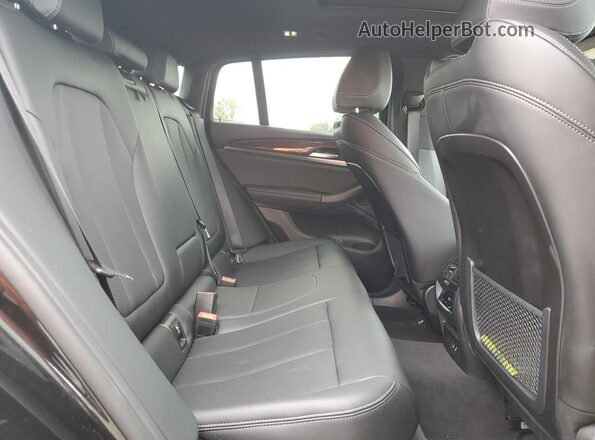 5UX33DT00R9V03588 2024 BMW X4 Черный Вид задней части салона