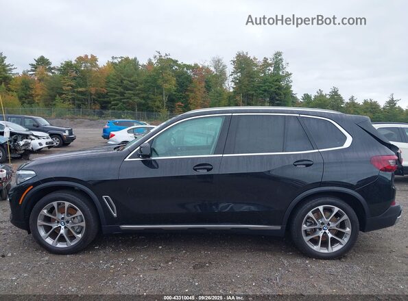 5UXCR6C05P9R78824 2023 BMW X5 Черный Вид задней части салона