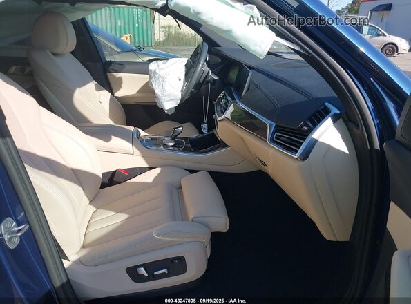 5UXCR6C07N9N32963 2022 BMW X5 Blue Vista interior delantera