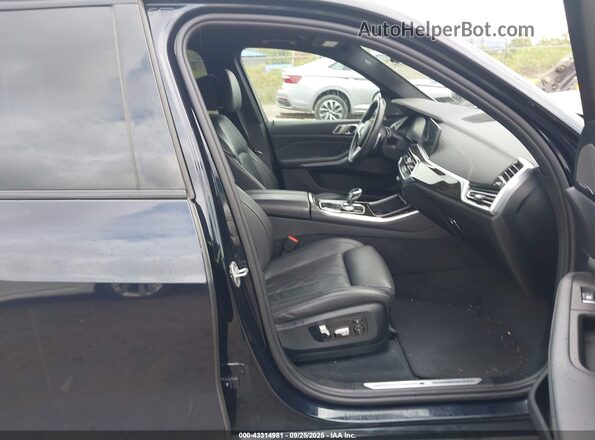 5UXCR6C08M9F35680 2021 BMW X5 Black Vista interior delantera