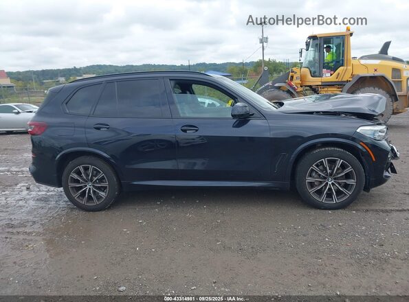 5UXCR6C08M9F35680 2021 BMW X5 Black Vista interior trasera