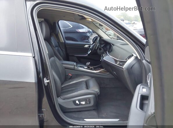 5UXCW2C07L9A01845 2020 BMW X7 Черный Вид салона спереди