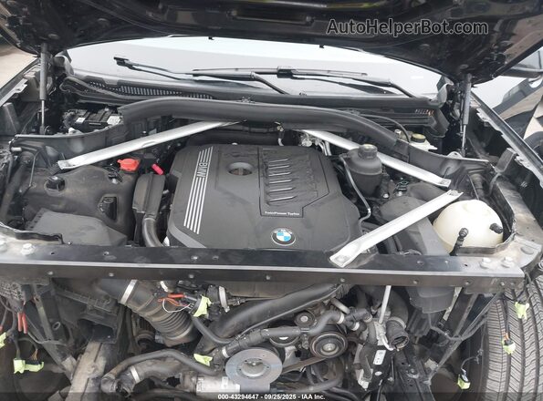 5UXCW2C07L9B00407 2020 BMW X7 Black Вид ззаду