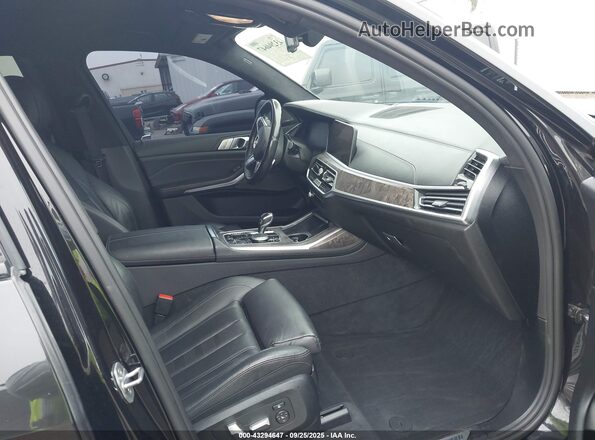 5UXCW2C07L9B00407 2020 BMW X7 Black Вид салону спереду