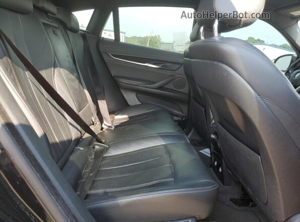 5UXKU2C50K0Z64910 2019 BMW X6 Черный Вид задней части салона