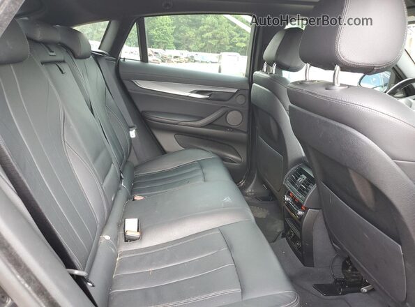 5UXKU2C54K0Z65137 2019 BMW X6 Черный Вид задней части салона