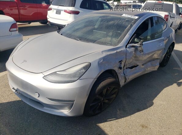 5YJ3E1EB0JF083446 2018 TESLA MODEL Silver წინა მარცხენა ხედი სამი მეოთხედიდან