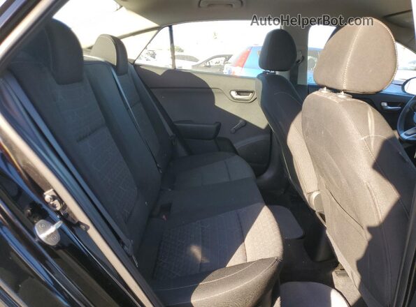 3KPA24AB3JE127632 2018 KIA RIO Черный Вид задней части салона