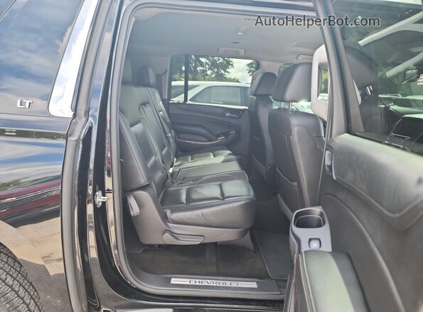 1GNSKHKC1JR108043 2018 CHEVROLET SUBURBAN Black Вид салону спереду