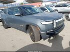 2023 Rivian R1t Adventure Quad Motor Large Pack Gray vin: 7FCTGAAAXPN018860