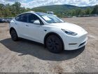2024 Tesla Model Y Long Range Dual Motor All-wheel Drive White vin: 7SAYGAEE2RF118125